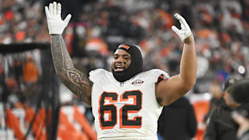 Dec 28, 2023; Cleveland, Ohio, USA; Cleveland Browns defensive tackle Siaki Ika (62) celebrates after the Browns beat the New York Jets at Cleveland Browns Stadium. Mandatory Credit: Ken Blaze-Imagn Images