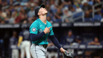 Jun 24, 2024; St. Petersburg, Florida, USA; Seattle Mariners pitcher Bryan Woo (22) reacts at the end of the first inning against the Tampa Bay Rays at Tropicana Field. Mandatory Credit: Kim Klement Neitzel-USA TODAY Sports