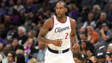 Apr 11, 2025; Sacramento, California, USA; Los Angeles Clippers forward Kawhi Leonard (2) reacts after making a three point basket against the Sacramento Kings during the second quarter at Golden 1 Center. Mandatory Credit: Darren Yamashita-Imagn Images