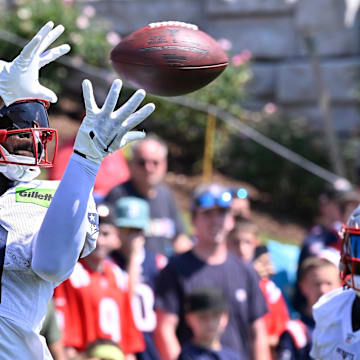 Jul 28, 2025; Foxborough, MA, USA; New England Patriots wide receiver Kayshon Boutte (9) makes a catch during training camp at Gillette Stadium. Mandatory Credit: Eric Canha-Imagn Images