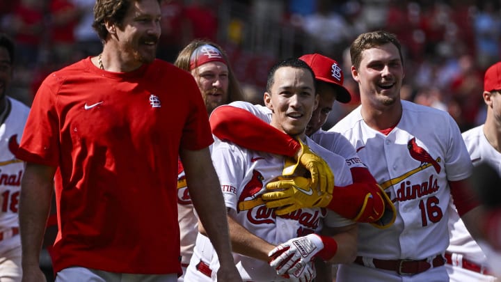 Aug 30, 2023; St. Louis, Missouri, USA;  St. Louis Cardinals center fielder Tommy Edman (19) celebrates with teammates after hitting a walk-off two run home run against the San Diego Padres during the ninth inning at Busch Stadium. Mandatory Credit: Jeff Curry-USA TODAY Sports