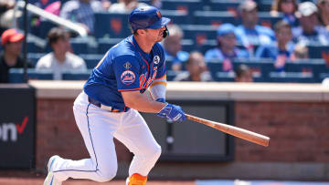 Jun 2, 2024; New York City, New York, USA;  New York Mets first baseman Pete Alonso (20) hits an RBI single during the third inning against the Arizona Diamondbacks at Citi Field. Mandatory Credit: