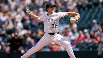 Apr 30, 2025; Denver, Colorado, USA; Colorado Rockies starting pitcher Chase Dollander (32) pitches in the second inning against the Atlanta Braves at Coors Field. Mandatory Credit: Isaiah J. Downing-Imagn Images