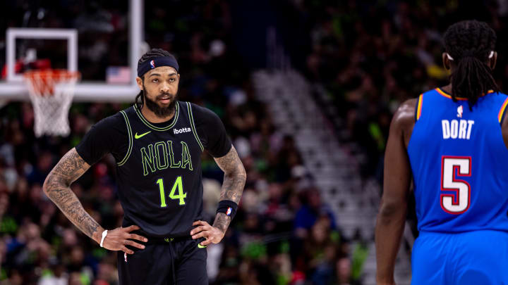 Apr 29, 2024; New Orleans, Louisiana, USA; New Orleans Pelicans forward Brandon Ingram (14) looks on against Oklahoma City Thunder guard Luguentz Dort (5) during the first half of game four of the first round for the 2024 NBA playoffs at Smoothie King Center. Mandatory Credit: Stephen Lew-USA TODAY Sports