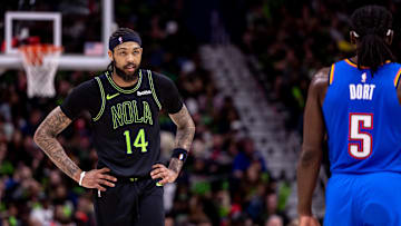 Apr 29, 2024; New Orleans, Louisiana, USA; New Orleans Pelicans forward Brandon Ingram (14) looks on against Oklahoma City Thunder guard Luguentz Dort (5) during the first half of game four of the first round for the 2024 NBA playoffs at Smoothie King Center. 