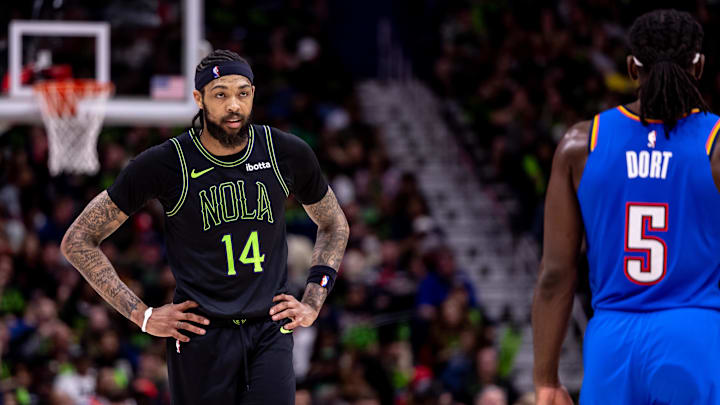 Apr 29, 2024; New Orleans, Louisiana, USA; New Orleans Pelicans forward Brandon Ingram (14) looks on against Oklahoma City Thunder guard Luguentz Dort (5) during the first half of game four of the first round for the 2024 NBA playoffs at Smoothie King Center. 