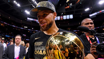 Jun 8, 2018; Cleveland, OH, USA; Golden State Warriors guard Stephen Curry (30) celebrates with the Larry O'Brien Championship Trophy after beating the Cleveland Cavaliers in game four of the 2018 NBA Finals at Quicken Loans Arena. Mandatory Credit: Kyle Terada-USA TODAY Sports