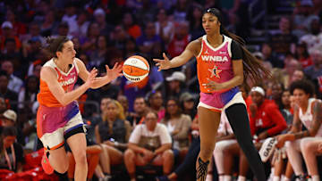 Jul 20, 2024; Phoenix, AZ, USA; Team WNBA guard Caitlin Clark (left) and Angel Reese against the USA Women's National Team during the 2024 WNBA All Star Game at Footprint Center. Mandatory Credit: Mark J. Rebilas-Imagn Images
