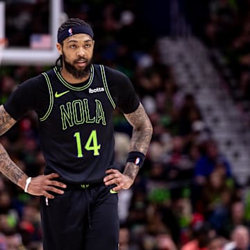 Apr 29, 2024; New Orleans, Louisiana, USA; New Orleans Pelicans forward Brandon Ingram (14) looks on against Oklahoma City Thunder guard Luguentz Dort (5) during the first half of game four of the first round for the 2024 NBA playoffs at Smoothie King Center. 