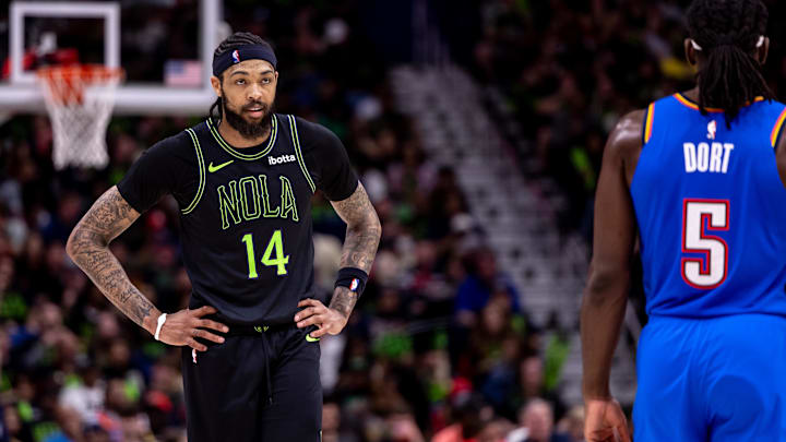 Apr 29, 2024; New Orleans, Louisiana, USA; New Orleans Pelicans forward Brandon Ingram (14) looks on against Oklahoma City Thunder guard Luguentz Dort (5) during the first half of game four of the first round for the 2024 NBA playoffs at Smoothie King Center. 