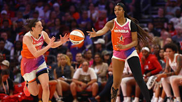 Jul 20, 2024; Phoenix, AZ, USA; Team WNBA guard Caitlin Clark (left) and Angel Reese against the USA Women's National Team during the 2024 WNBA All Star Game at Footprint Center. Mandatory Credit: Mark J. Rebilas-Imagn Images