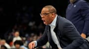 Mar 13, 2025; Charlotte, NC, USA; North Carolina Tar Heels head coach Hubert Davis reacts in the first half at Spectrum Center. Mandatory Credit: Bob Donnan-Imagn Images