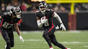 Dec 7, 2025; Atlanta, Georgia, USA; Atlanta Falcons tight end Kyle Pitts Sr. (8) runs after a catch against the Seattle Seahawks at Mercedes-Benz Stadium. Mandatory Credit: Dale Zanine-Imagn Images
