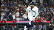 Sep 8, 2025; Seattle, Washington, USA; Seattle Mariners first baseman Josh Naylor (12) reacts after hitting a two-run double against the St. Louis Cardinals during the sixth inning at T-Mobile Park.
