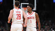 Nov 1, 2025; Boston, Massachusetts, USA; Houston Rockets forward Amen Thompson (1) and center Alperen Sengun (28) react during the second half against the Boston Celtics at TD Garden. Mandatory Credit: Paul Rutherford-Imagn Images