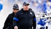 Nov 16, 2024; Lexington, Kentucky, USA; Kentucky Wildcats head coach Mark Stoops walks onto the field before the game against the Murray State Racers at Kroger Field. Mandatory Credit: Jordan Prather-Imagn Images