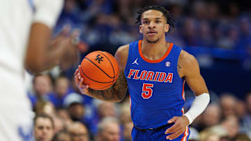 Jan 4, 2025; Lexington, Kentucky, USA; Florida Gators guard Will Richard (5) brings the ball up court during the first half against the Kentucky Wildcats at Rupp Arena at Central Bank Center. Mandatory Credit: Jordan Prather-Imagn Images