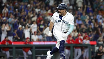 Sep 8, 2025; Seattle, Washington, USA; Seattle Mariners first baseman Josh Naylor (12) reacts after hitting a two-run double against the St. Louis Cardinals during the sixth inning at T-Mobile Park.
