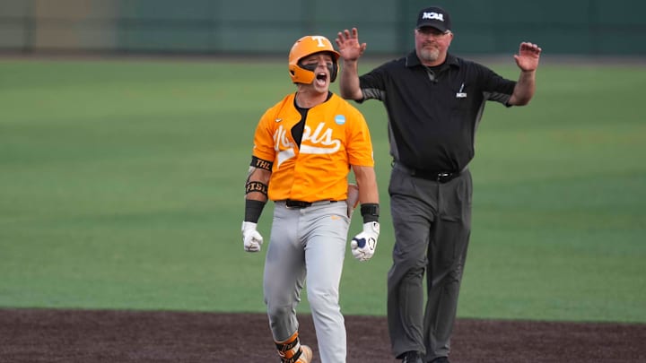 Tennessee infielder Andrew Fischer (11) yells in celebration after hitting a double during a NCAA regional baseball game between the Tennessee Volunteers and Cincinnati Bearcats at Lindsey Nelson Stadium in Knoxville, Tenn., on May 31, 2025.