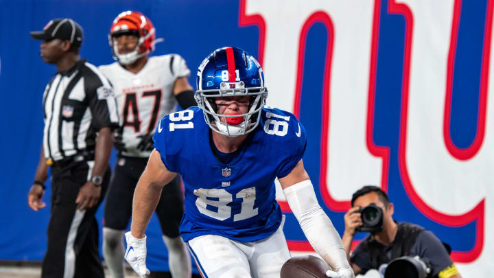 Aug 21, 2022; East Rutherford, New Jersey, USA;  New York Giants wide receiver Alex Bachman (81) scores a touchdown against the Cincinnati Bengals at MetLife Stadium.  