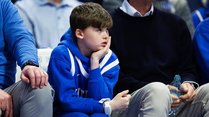 Mar 7, 2026; Lexington, Kentucky, USA; A young Kentucky Wildcats fan watches the game during the second half against the Florida Gators at Rupp Arena at Central Bank Center. Mandatory Credit: Jordan Prather-Imagn Images