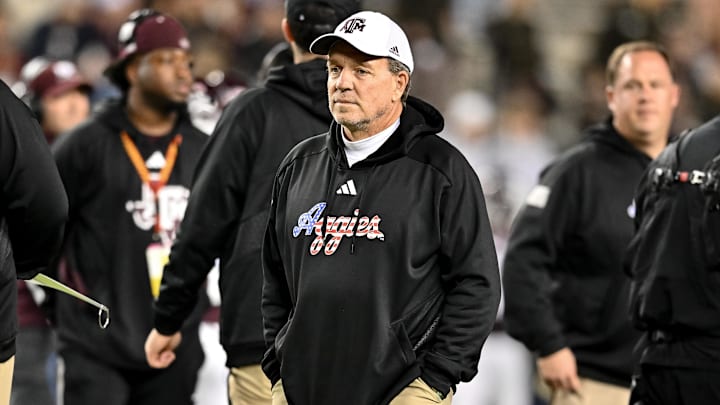 Nov 11, 2023; College Station, Texas, USA; Texas A&M Aggies head coach Jimbo Fisher looks on during warm ups prior to the game against the Mississippi State Bulldogs at Kyle Field. Mandatory Credit: Maria Lysaker-Imagn Images