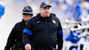 Nov 16, 2024; Lexington, Kentucky, USA; Kentucky Wildcats head coach Mark Stoops walks onto the field before the game against the Murray State Racers at Kroger Field. Mandatory Credit: Jordan Prather-Imagn Images