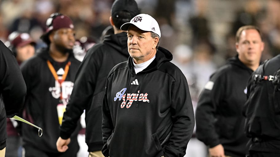 Jimbo Fisher looks on during warmups of a Texas A&M game in 2023.