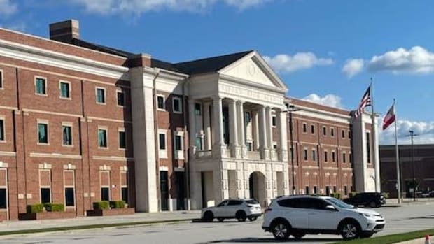 Buford High School's architecture is reflected in the new stadium across the street.