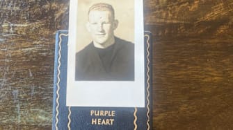 The Purple Heart of Jerry Mahoney was presented to Sacred Heart Cathedral officials hours before Friday's Bruce-Mahoney game with arch-rival St. Ignatius and will officially be enshrined Tuesday during a Mass on the San Francisco campus on Veterans Day.