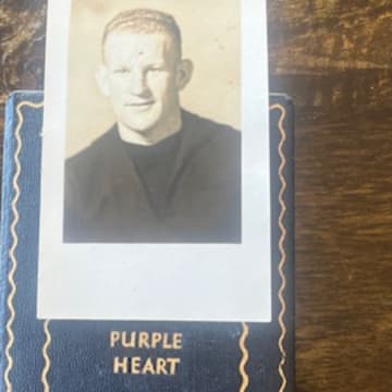 The Purple Heart of Jerry Mahoney was presented to Sacred Heart Cathedral officials hours before Friday's Bruce-Mahoney game with arch-rival St. Ignatius and will officially be enshrined Tuesday during a Mass on the San Francisco campus on Veterans Day.