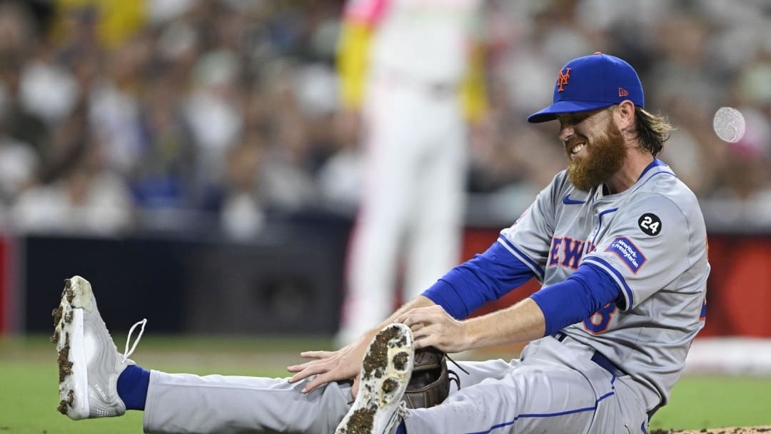 Aug 23, 2024; San Diego, California, USA; New York Mets starting pitcher Paul Blackburn (58) reacts after being hit during the third inning against the San Diego Padres at Petco Park. Mandatory Credit: Denis Poroy-USA TODAY Sports