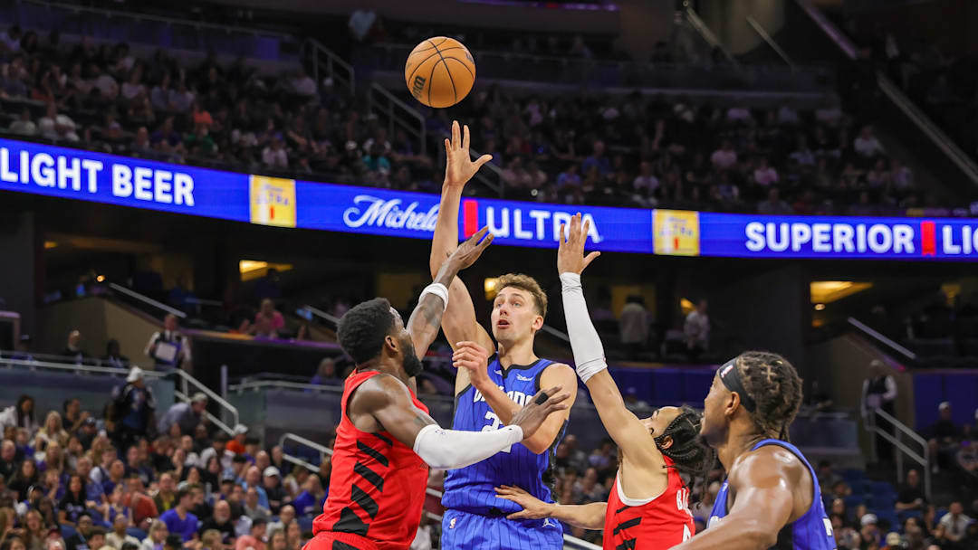 Apr 1, 2024; Orlando, Florida, USA; Orlando Magic forward Franz Wagner (22) shoots the ball over
