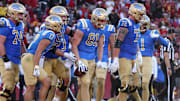 Nov 18, 2023; Los Angeles, California, USA; UCLA Bruins tight end Hudson Habermehl (81) celebrates with teammates after scoring a touchdown during the fourth quarter against the USC Trojans at United Airlines Field at Los Angeles Memorial Coliseum. Mandatory Credit: Jason Parkhurst-Imagn Images