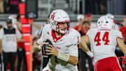 Nov 7, 2025; Orlando, Florida, USA; Houston Cougars quarterback Conner Weigman (1) looks to pass during the first quarter against the UCF Knights at Acrisure Bounce House. Mandatory Credit: Mike Watters-Imagn Images
