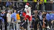 Nov 7, 2025; Orlando, Florida, USA; Houston Cougars wide receiver Amare Thomas (0) catches a pass during the first quarter against the UCF Knights at Acrisure Bounce House. Mandatory Credit: Mike Watters-Imagn Images