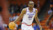 Feb 22, 2024; El Paso, Texas, USA; LA Tech Bulldogs Aggies forward Isaiah Crawford (22) dribbles the ball against the UTEP Miners defense in the first half at Don Haskins Center. Mandatory Credit: Ivan Pierre Aguirre-USA TODAY Sports