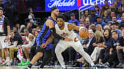 May 3, 2024; Orlando, Florida, USA; Cleveland Cavaliers forward Evan Mobley (4) is fouled by Orlando Magic guard Jalen Suggs (4) during the second quarter of game six of the first round for the 2024 NBA playoffs at Kia Center. Mandatory Credit: Mike Watters-USA TODAY Sports