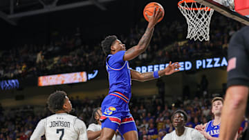 Jan 5, 2025; Orlando, Florida, USA; Kansas Jayhawks guard AJ Storr (2) goes to the basket during the second half against the UCF Knights at Addition Financial Arena. Mandatory Credit: Mike Watters-Imagn Images