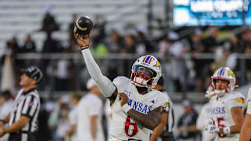Oct 4, 2025; Orlando, Florida, USA; Kansas Jayhawks quarterback Jalon Daniels (6) warms up before the game against the UCF Knights at FBC Mortgage Stadium. Mandatory Credit: Mike Watters-Imagn Images