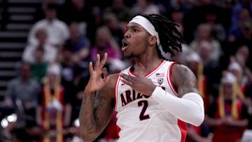 Mar 23, 2024; Salt Lake City, UT, USA; Arizona Wildcats guard Caleb Love (2) reacts after a basket during the first half in the second round of the 2024 NCAA Tournament against the Dayton Flyers at Vivint Smart Home Arena-Delta Center. Mandatory Credit: Gabriel Mayberry-Imagn Images