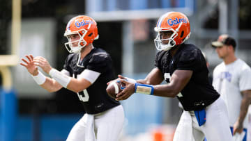 Florida Gators quarterback DJ Lagway (2) and Florida Gators quarterback Graham Mertz (15) participate in a drill during fall football practice at Heavener Football Complex at the University of Florida in Gainesville, FL on Thursday, August 1, 2024. [Matt Pendleton/Gainesville Sun]