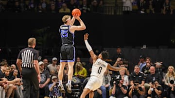 Richie Saunders loads up for a long-range bucket.