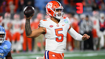 Dec 3, 2022; Charlotte, North Carolina, USA; Clemson Tigers quarterback DJ Uiagalelei (5)throws during the first quarter of the ACC Championship game against the North Carolina Tar Heels at Bank of America Stadium. Mandatory Credit: Bob Donnan-Imagn Images