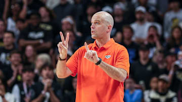 Mar 5, 2025; Orlando, Florida, USA; Oklahoma State Cowboys head coach Steve Lutz motions to the court during the first half against the UCF Knights at Addition Financial Arena. Mandatory Credit: Mike Watters-Imagn Images