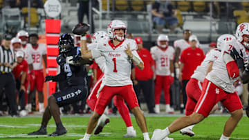 Nov 7, 2025; Orlando, Florida, USA; Houston Cougars quarterback Conner Weigman (1) drops back to pass during the first quarter against the UCF Knights at Acrisure Bounce House. Mandatory Credit: Mike Watters-Imagn Images