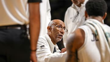 Mar 5, 2025; Orlando, Florida, USA; UCF Knights head coach Johnny Dawkins talks to the team in the second half during a timeout against the Oklahoma State Cowboys at Addition Financial Arena. Mandatory Credit: Mike Watters-Imagn Images