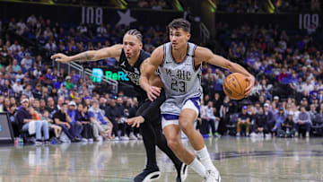 Dec 29, 2024; Orlando, Florida, USA; Brooklyn Nets forward Jalen Wilson (22) defends Orlando Magic forward Tristan da Silva (23) during the second half at Kia Center. Mandatory Credit: Mike Watters-Imagn Images
