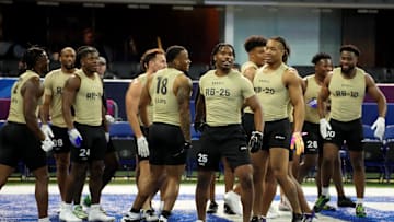 Mar 2, 2024; Indianapolis, IN, USA; Running backs celebrate after a drill during the 2024 NFL