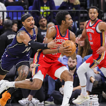 Mar 21, 2024; Orlando, Florida, USA; Orlando Magic guard Gary Harris (14) defends New Orleans Pelicans forward Herbert Jones (5) during the second quarter at KIA Center. Mandatory Credit: Mike Watters-Imagn Images